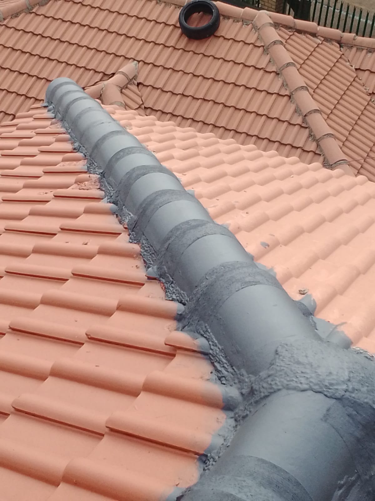 Detailed roofing repair and gutter maintenance work